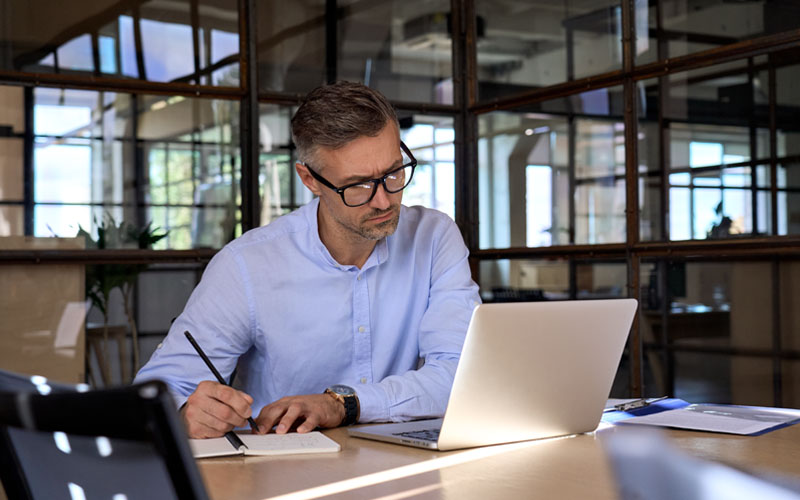 man working on laptop