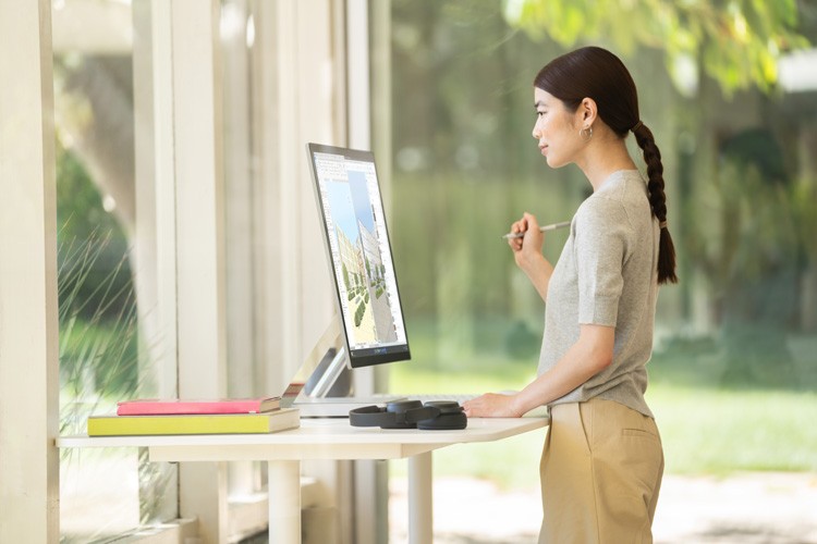Surface Studio 2+ Woman working on Surface Studio 2+