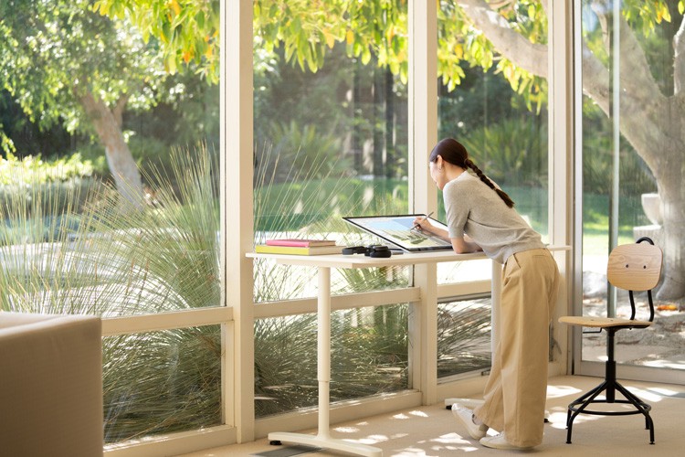 Surface Studio 2+ Woman working on Surface Studio 2+